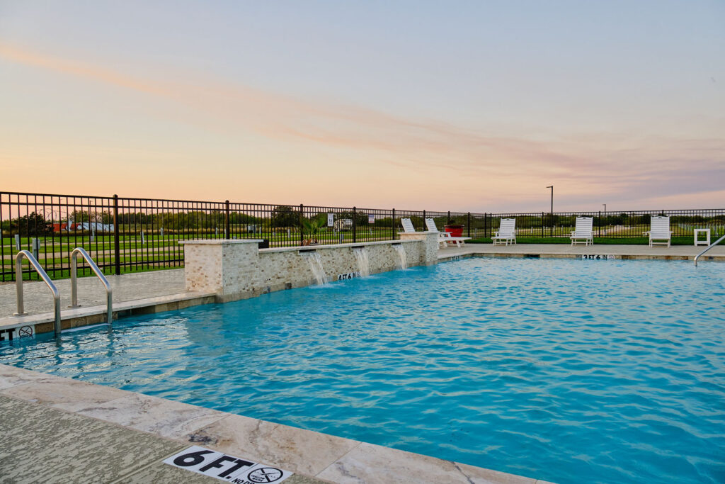 Resort-style pool with tanning ledge at Harbor View RV Resort in Matagorda, Texas