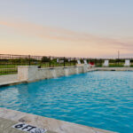 Resort-style pool with tanning ledge at Harbor View RV Resort in Matagorda, Texas